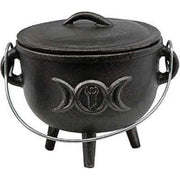 Black cast iron cauldron with lid featuring a triple moon symbol on a white background