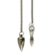 A silver pendulum with a goddess on one end and the pendulum on the other  on a chain against a white background