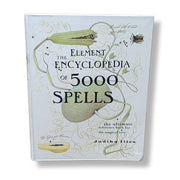 Book titled 'The Encyclopedia of 5000 Spells' with decorative elements on a white background