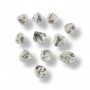 Tumbled quartz crystal  on a white background