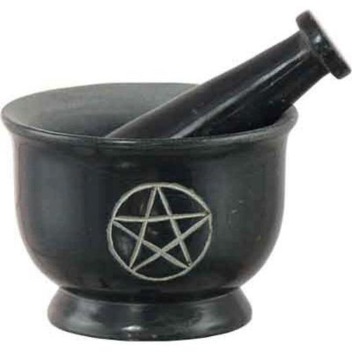 Black mortar and pestle with a pentagram symbol on a white background