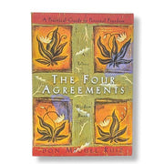 Book cover of 'The Four Agreements' with colorful square designs and text.