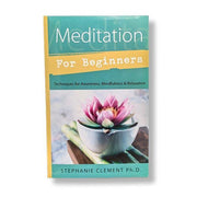 Book titled 'Meditation for Beginners' with a pink flower on a white background