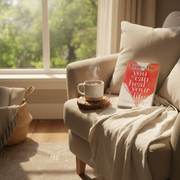 Cozy living room with a cup of coffee and a book on a couch
