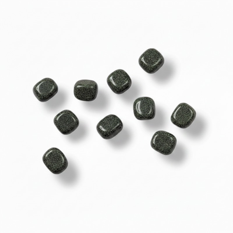 Nine small rounded square dark gray stone tiles with a speckled texture, arranged on a clean white background with soft drop shadows.