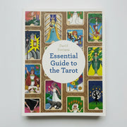 Book titled 'Essential Guide to the Tarot' with tarot card designs on the cover