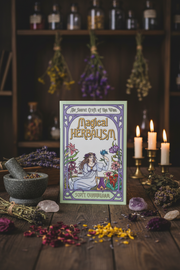 Magical Herbalism book with herbs, candles, and a mortar and pestle on a wooden surface.