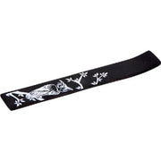 Black incense burner with white designs on a white background