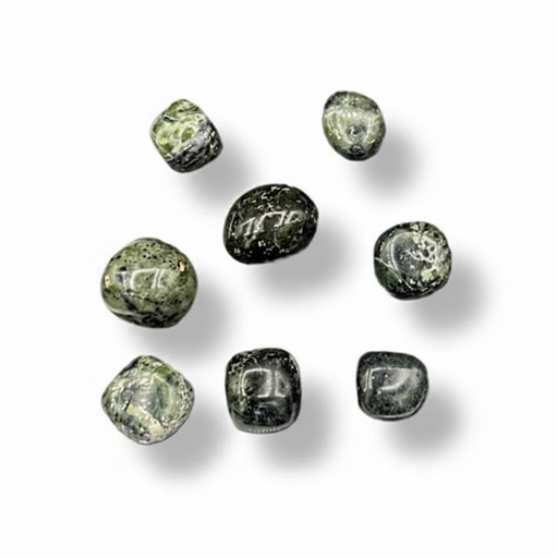 Greenish-brown stones on a white surface