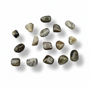 Collection of labradorite tumbled stones on a white background