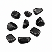 Black stones on a white background