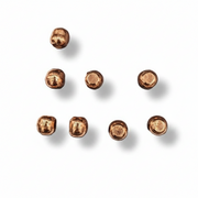 Copper spheres arranged in a pattern on a white background