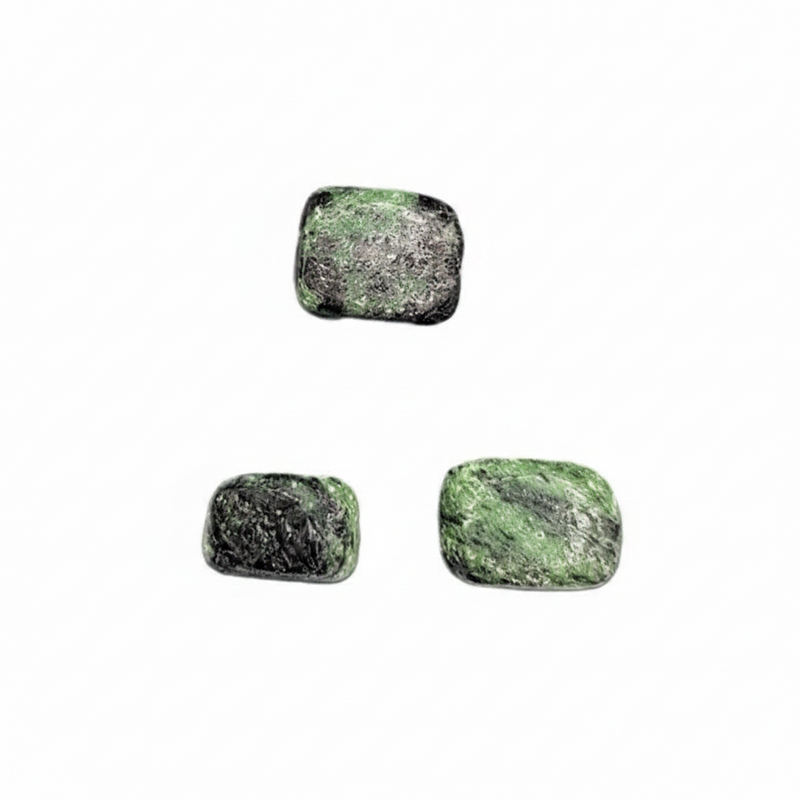 Four green and black stone earrings on a white background