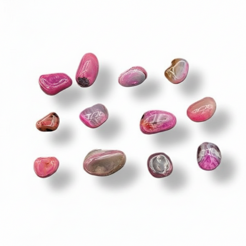 Pink and purple stones on a white background