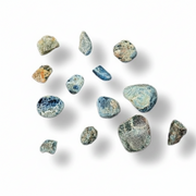 A set of polished Blue Apatite Tumbled  in shades of blue, gray, and beige, arranged on a clean white background with soft drop shadows.