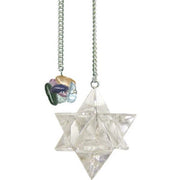 Crystal Merkaba pendulum on a chain against a white background
