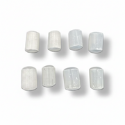 White Selenite rocks on a white background