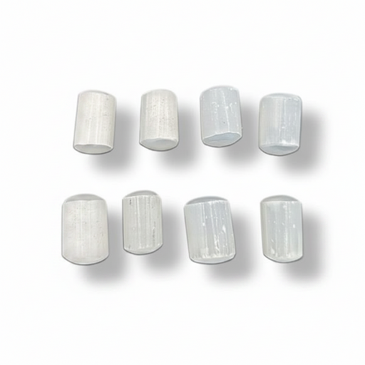 White Selenite rocks on a white background