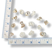 Snake Skin Agate Tumbled  on a white background with a ruler for scale