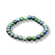 Multicolored beaded bracelet on a white background