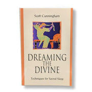 Book titled 'Dreaming the Divine' by Scott Cunningham on a white background