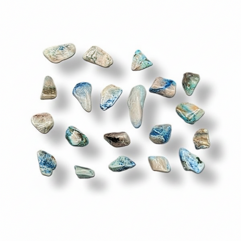 A set of polished tumbled pebble stones in shades of blue, beige, gray, and white, arranged on a clean white background with soft drop shadows.