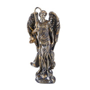 Bronze angel statue with wings spread on a white background