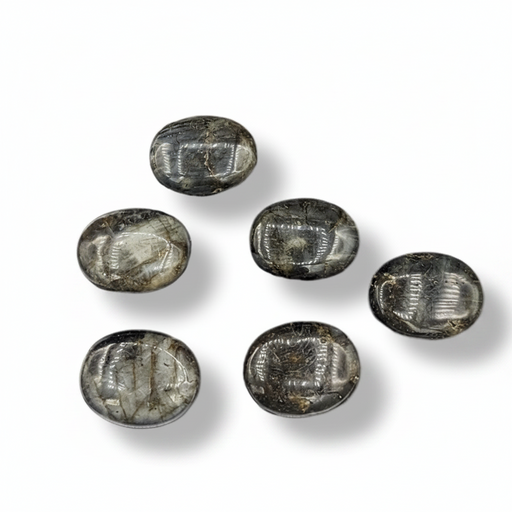 Labradorite palm stones on a white background