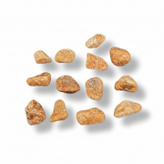 Orange stones on a white background