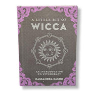 Book titled 'A Little Bit of Wicca' by Cassandra Eason with a purple border on a white background