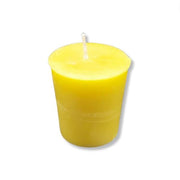 Yellow candle on a white background