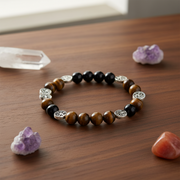 Jewelry bracelet with beads on a wooden surface with crystals