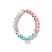 Bracelet with pink and blue beads on a white background