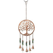 Decorative wind chime with tree of life design and hanging bells on a white background