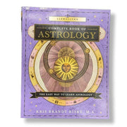 Book titled 'Llewellyn's Complete Book of Astrology' on a white background