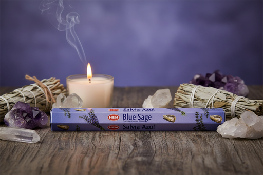 Hem Incense Blue Sage 20g Approximate  on a table with a burning tea light, crystals and sage.