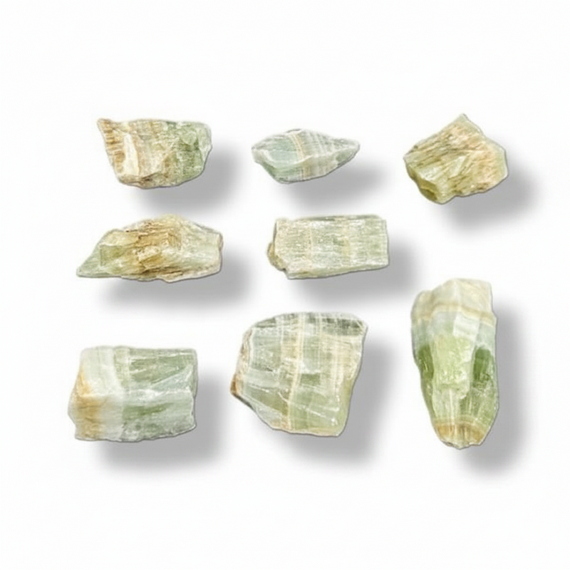 Nine raw, rough calcite with natural striated patterns in pale green, beige, and cream, arranged in a 3x3 grid on a white background with soft drop shadows.