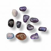 Collection of multicolored stones on a white background