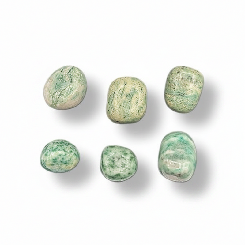 Fuchsite in quartz tumbled on a white background