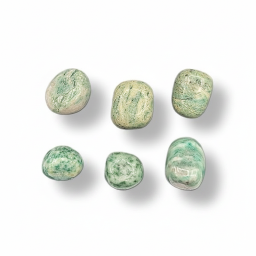 Fuchsite in quartz tumbled on a white background