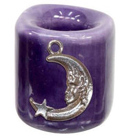 Purple candle holder with silver moon and star pendant on a white background