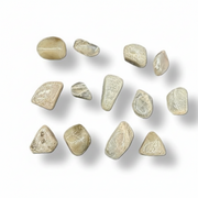 Thirteen polished tumbled stones in a light green and beige tone, arranged in rows on a white background with soft drop shadows.