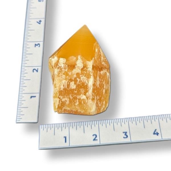 Orange Calcite Cut Base 208g Point Approximate