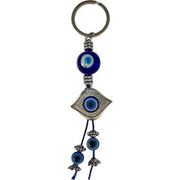 Keychain with blue evil eye beads on a white background