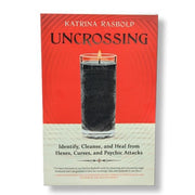 Book cover of 'Uncrossing' by Katrina Rasbold with a red background and a glass of dark liquid.