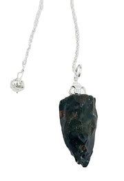 Pendulum with a dark stone on a white  background