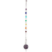 Chakra pendulum with an amethyst sephoroton on a white background.