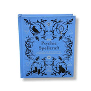 Blue book titled 'Psychic Spellcraft' with black decorative text and symbols on a white background