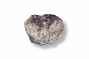 A piece of purple amethyst crystal with natural white and gray crystalline inclusions, photographed on a clean white background with a soft drop shadow.