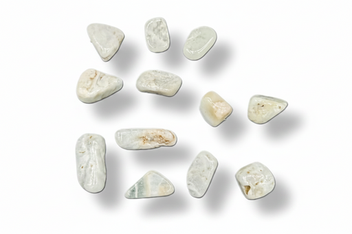 A set of polished light blue tumbled stones or pendants arranged on a plain white background with soft drop shadows.